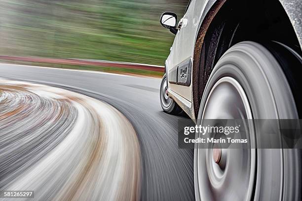 car driving fast - suv stock-fotos und bilder
