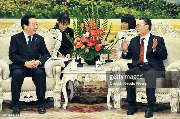 China - Japanese Prime Minister Yoshihiko Noda holds talks with China's top legislator Wu Bangguo at the Great Hall of the People in Beijing on Dec....
