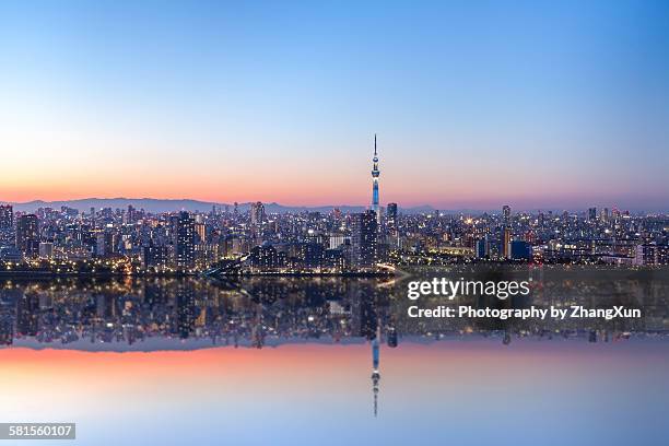 urban reflection image of tokyo at night - tokyo prefecture stockfoto's en -beelden