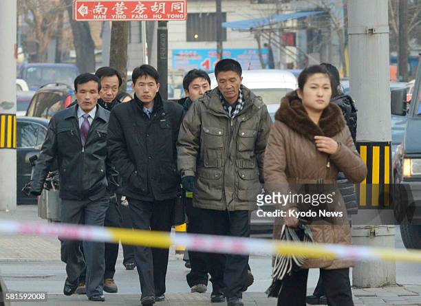China - North Koreans head to the North Korean Embassy in Beijing on Dec. 28 timing their visit to coincide with Kim Jong Il's funeral in Pyongyang.