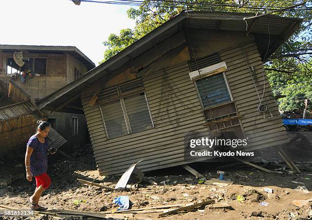 Philippines - Photo taken Dec. 30 shows a house destroyed by flash floods caused by tropical storm Washi two weeks ago in Cagayan de Oro on the...