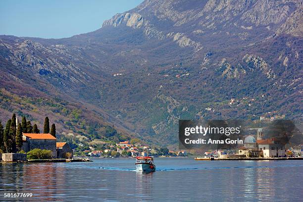 perast montenegro shuttle boat on bay of kotor - our lady of the rocks stock pictures, royalty-free photos & images