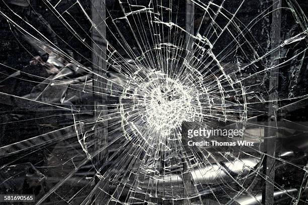 smashed store window - destruction stock pictures, royalty-free photos & images