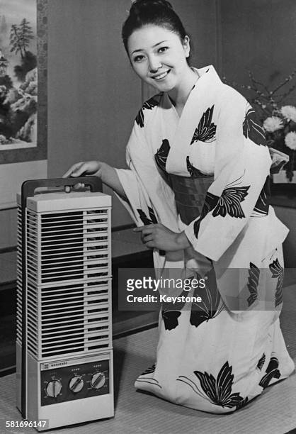 An electric fan designed to resemble a Japanese lantern, made by the Matsushita Electric Company , Japan, 24th March 1972. The fans sell for 19,900...