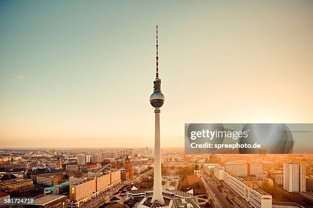 berlin skyline with tv tower, (fernsehturm) - sunset city stock-fotos und bilder