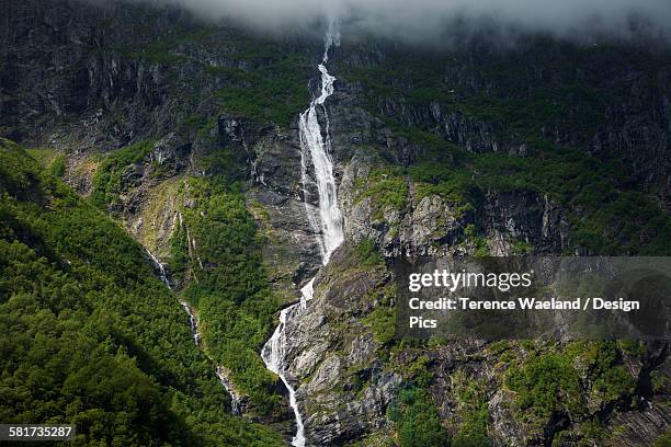 waterfall in the rauma valley, near olden - terence waeland stock pictures, royalty-free photos & images