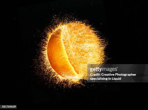 orange burst - orange burst stock pictures, royalty-free photos & images