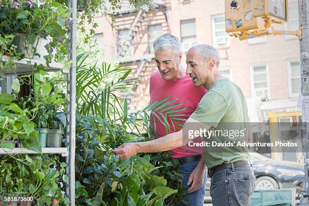 Senior Gay Couple Shopping for Houseplants on New York City Street