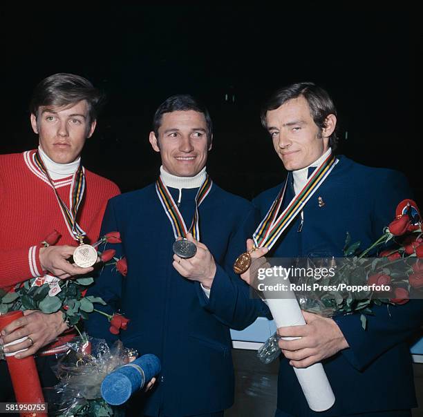 Winners of the men's downhill ski competition at the 1968 Winter Olympics pose with their respective medals at Grenoble in France in February 1968....