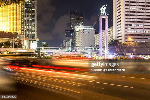 traffic rush in jakarta at night - newly industrialized country stock pictures, royalty-free photos & images