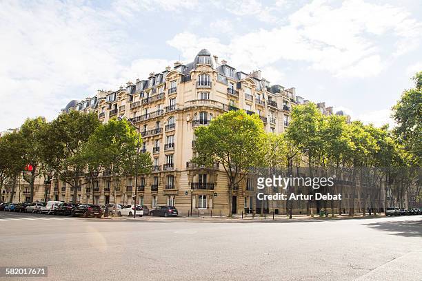 paris city corner with residential building - street paris stock pictures, royalty-free photos & images