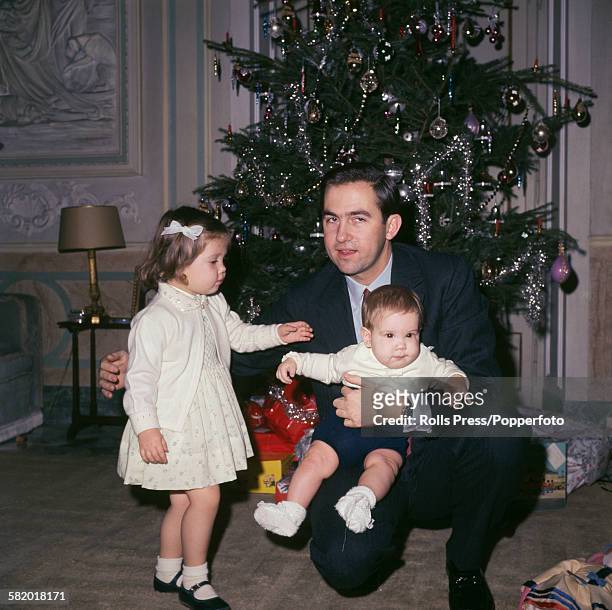 King Constantine II of Greece pictured with his daughter Princess Alexia of Greece and Denmark and son Pavlos, Crown Prince of Greece in exile in...
