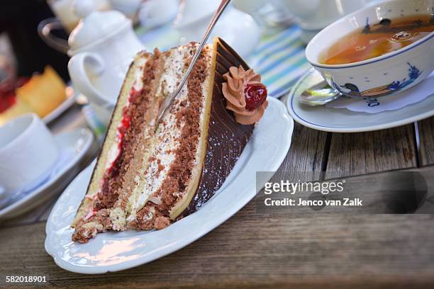 cake and thee - jenco van zalk stock pictures, royalty-free photos & images