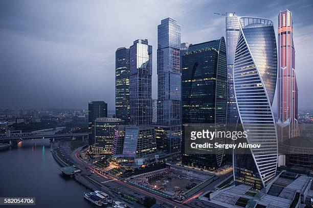 moody morning over moscow international business center - bridge building glass stock pictures, royalty-free photos & images