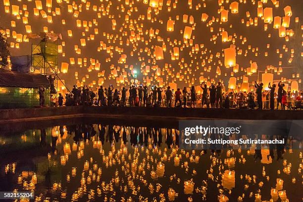 sky lanterns firework festival, chiang mai, thailand, loy krathong and yi peng festival. - vip travel stock pictures, royalty-free photos & images