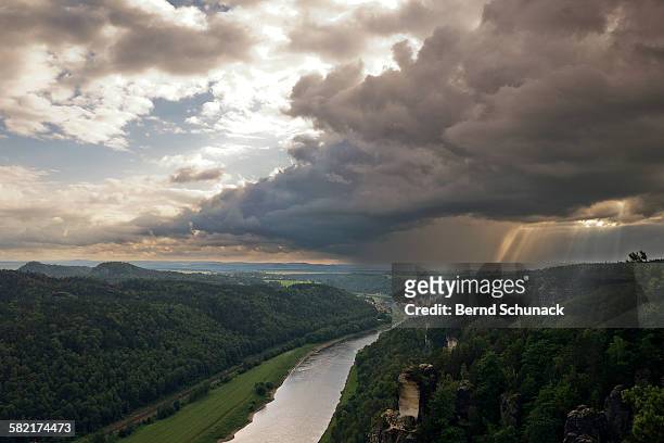 rain showers above elbe valley - bernd schunack stock pictures, royalty-free photos & images