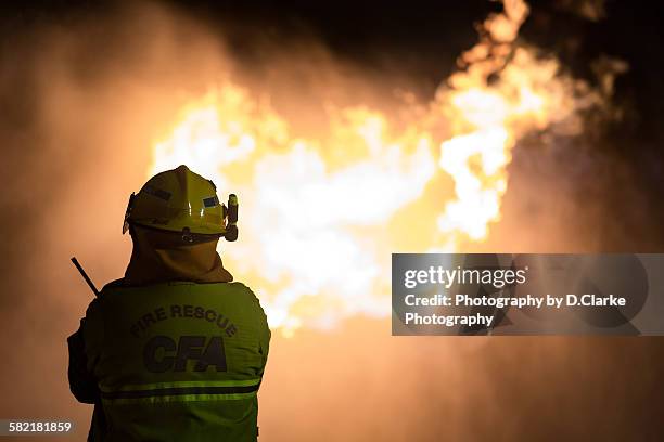 burning - australian firefighter stock pictures, royalty-free photos & images