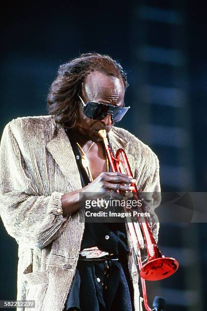 Miles Davis performs at the Amnesty International Concert at Giants Stadium circa 1986 in East Rutherford, New Jersey.