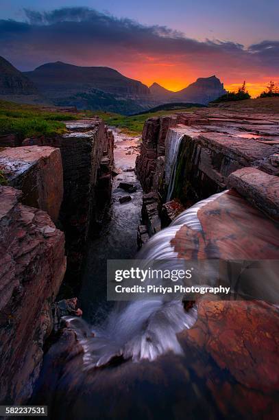 triple falls - logan pass stock-fotos und bilder