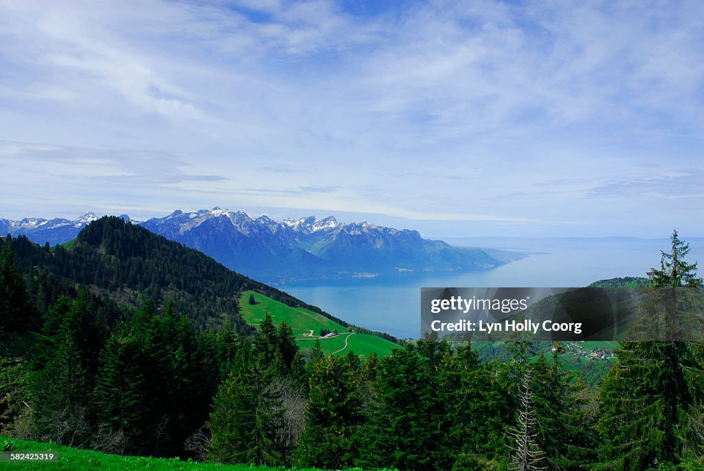 Lake geneva with mountains in foreground