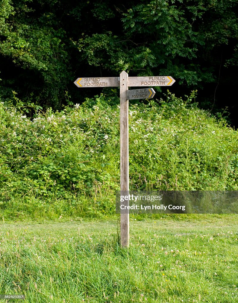 Wooden public footpath sign