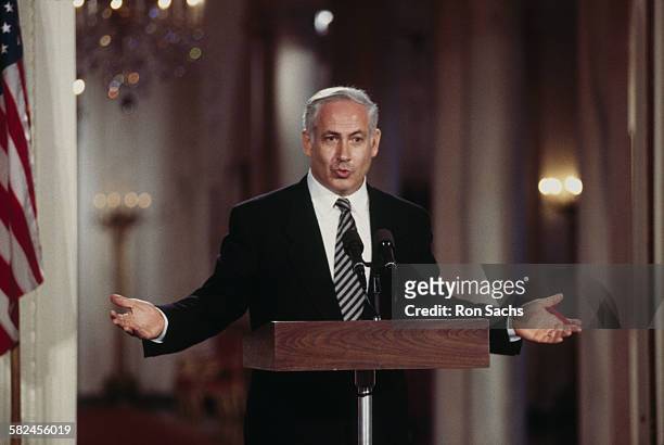 Israeli Prime Minister Benjamin Netanyahu speaking at a White House press conference, Washington DC, 9th July 1996. Netanyahu is on his first...