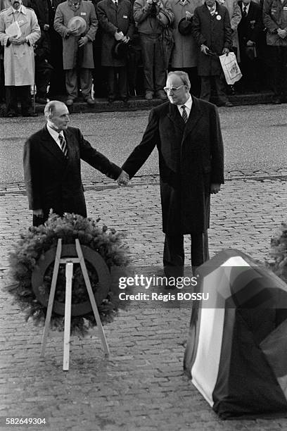 French President François Mitterrand and Chancellor of Germany Helmut Kohl pay homage to fallen soldiers from the First World War at a Franco-German...