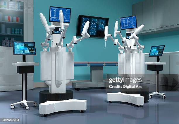 surgical robots - surgical robotics stock pictures, royalty-free photos & images