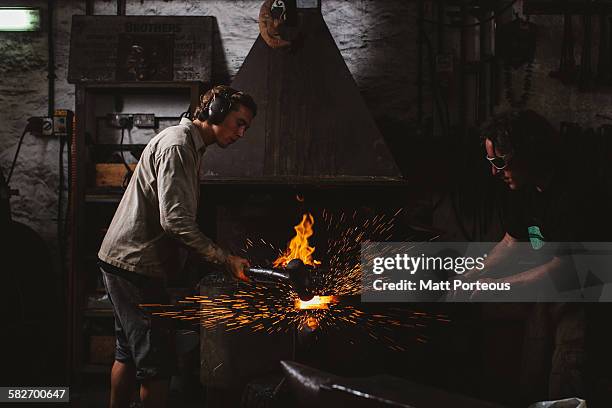 black smith - blacksmith sparks stock pictures, royalty-free photos & images