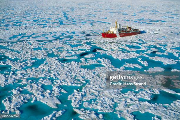 canadian coast guard icebreaker in m'clure strait - coast guard stock pictures, royalty-free photos & images