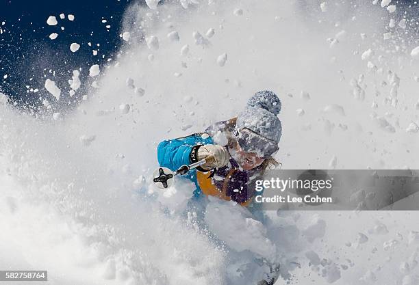 woman skiing deep powder at alta, utah - powder snow fotografías e imágenes de stock