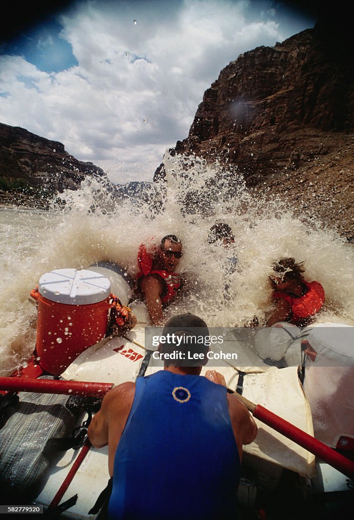Raft Running Rapids in Cataract Canyon
