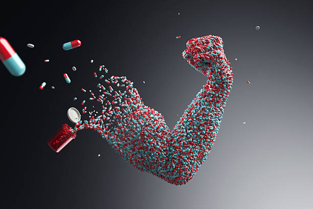 pills shaping muscle arm - performance enhancing drugs stock pictures, royalty-free photos & images