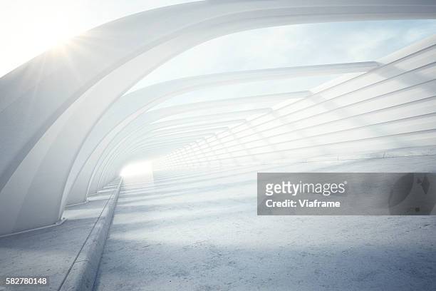 bright, modern white tunnel - cable stayed bridge stock pictures, royalty-free photos & images
