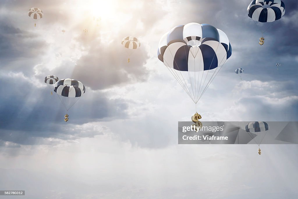 Parachutes with dollar sign falling from sky