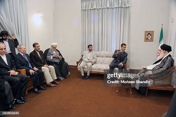 Syrian President Bashar al-Assad meets with Iranian Supreme Leader Ayatollah Ali Khamenei as Iran's new President Mahmoud Ahmadinejad listens during...