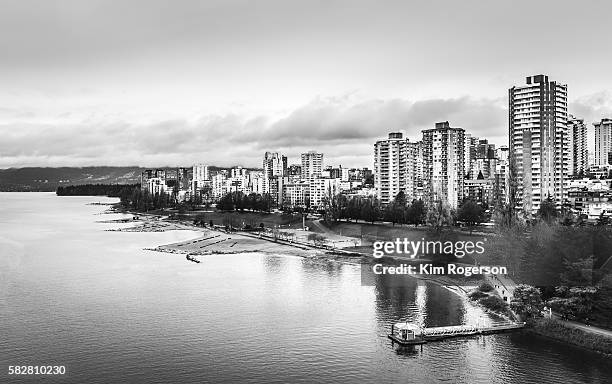 black & white west end apartments on english bay, vancouver, canada - english bay stockfoto's en -beelden