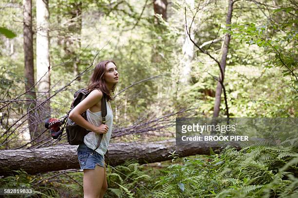 woman on journey exploring nature on hike - women in daisy dukes ストックフォトと画像