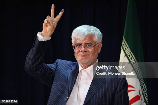 Former Iranian vice president Mohammad Reza Aref waves during after he register his candidency for Irans 11 th presidential election. At the interior...