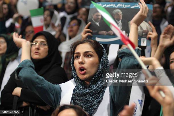Iranian supporters of first vice president and reformist presidential candidate, Mohammadreza Aref shout slogans during his campaign rally in Tehran...