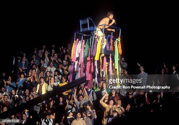 MIck Jagger/Rolling Stones performing at the Hartford Civic Center, Nov 9,1981 Mick rides the cherry picker over the crowd.
