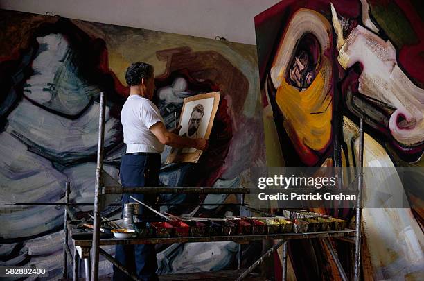 Painter David Alfaro Siqueiros at Work in His Studio