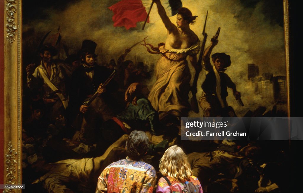 Couple Viewing Liberty Leading the People (July 28, 1830) by Eugene Delacroix