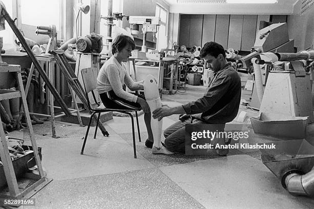 Valia Voronkova, a young Russian girl who lost her leg in the wake of the Chernobyl disaster, has her last artificial limb fitting. On April 26 the...