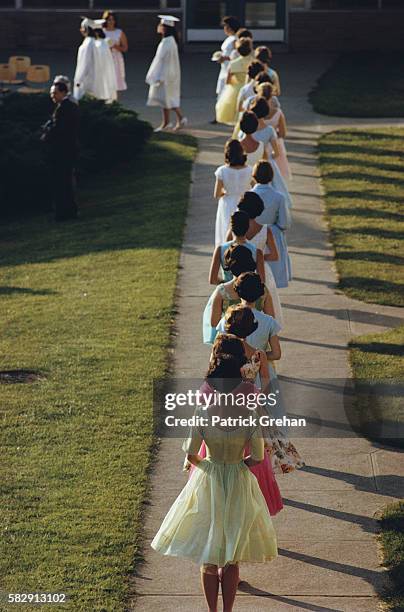 Female Graduates Standing in Line