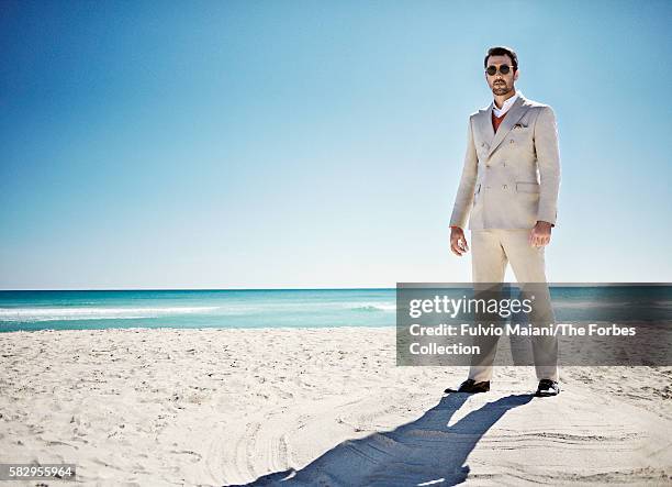 Styling by Joseph DeAcetis with grooming by Steven Hoeppner. Photographed at The Setai, Miami Beach. Double-breasted cotton suit, wool V-neck sweater...