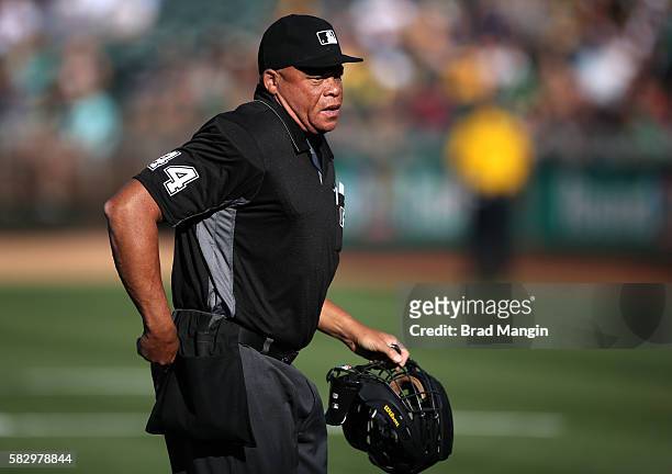 Home plate umpire Kerwin Danley works during the game between the Tampa Bay Rays and Oakland Athletics at the Oakland Coliseum on Saturday, July 23,...