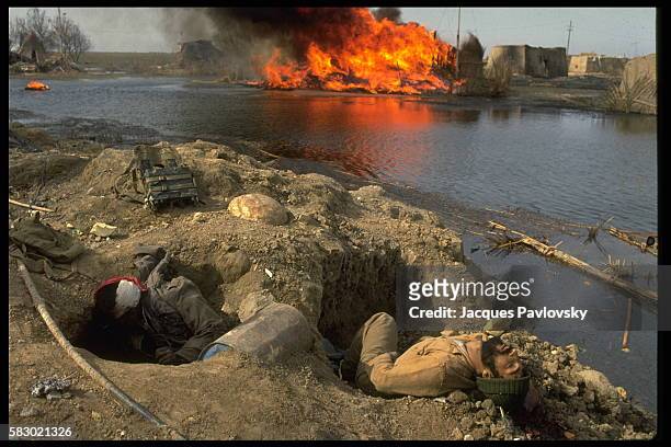 The body of an Iranian soldier following combat that took place in Al Beida in Iraq in 1984. The war between Iran and Iraq broke out in 1980 and...
