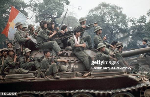 North Vietnamese troops enter Saigon on tanks, ending the Vietnam War.