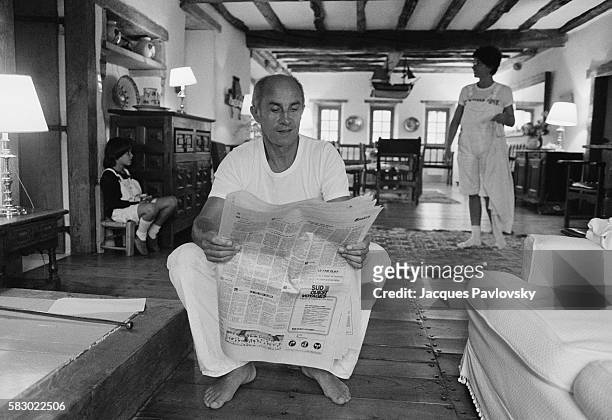 French fashion designer André Courrèges and his wife Coqueline in the main living room of their Basque country farm "la Machoenia" near St. Jean de...